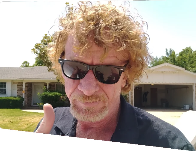 Bill Baker outside an Oklahoma home